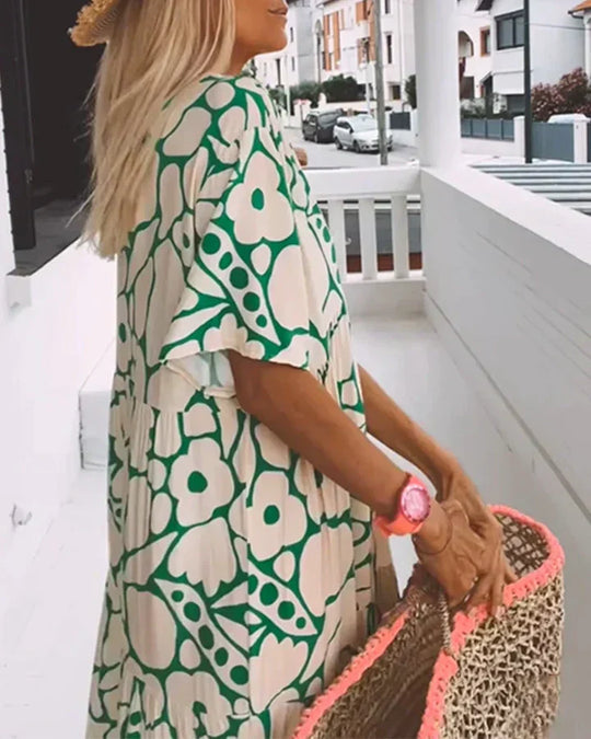 Cristina | Vestido largo de verano con corte fluido y elegante estampado gráfico