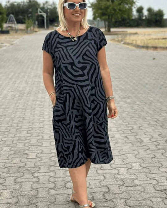 Nelia - Vestido fluido de verano con estampado abstracto y bolsillos