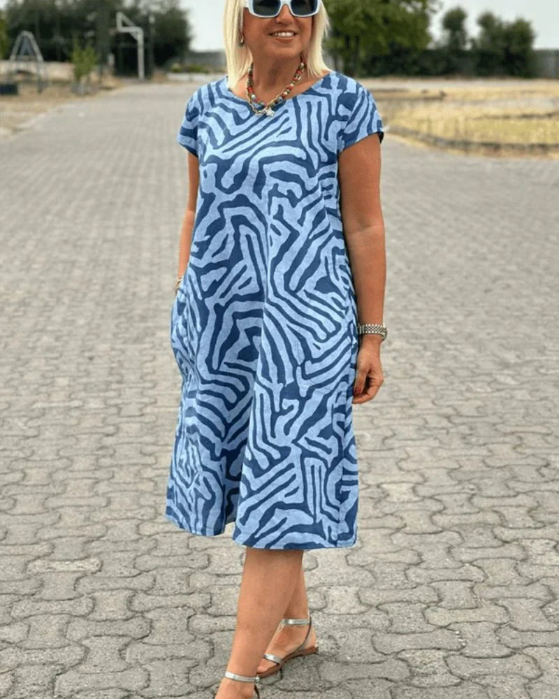 Nelia - Vestido fluido de verano con estampado abstracto y bolsillos