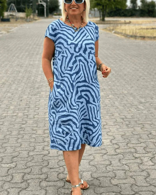 Nelia - Vestido fluido de verano con estampado abstracto y bolsillos
