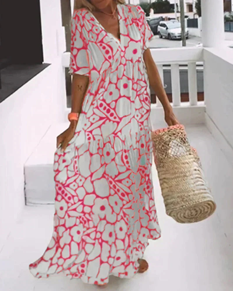 Cristina | Vestido largo de verano con corte fluido y elegante estampado gráfico