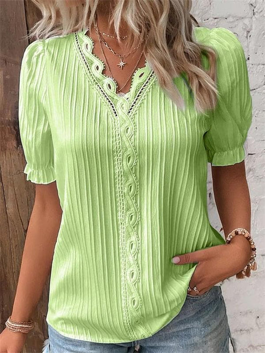 Pilar - Blusa plisada con encaje y manga abullonada