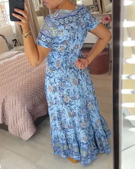 Valeria™ Vestido largo floral con escote en V, manga corta y vuelo amplio