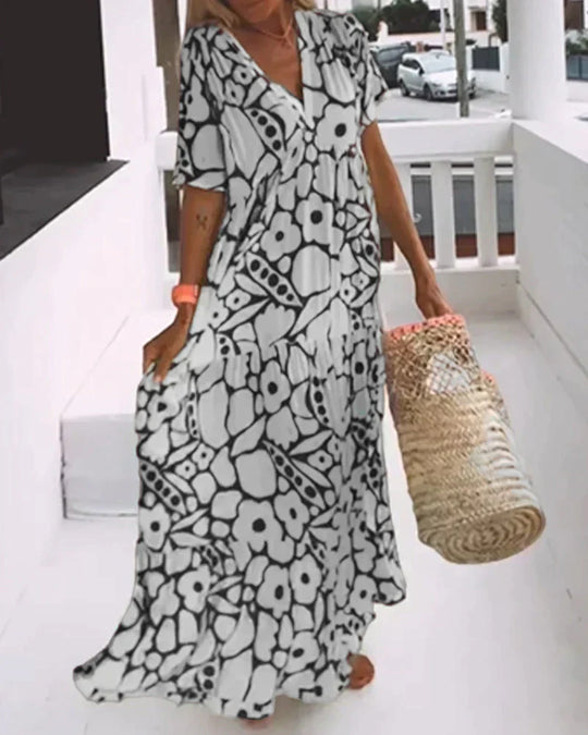 Cristina | Vestido largo de verano con corte fluido y elegante estampado gráfico