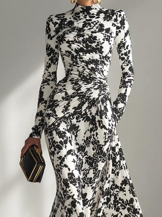 Greta – Vestido maxi cruzado estampado en blanco y negro