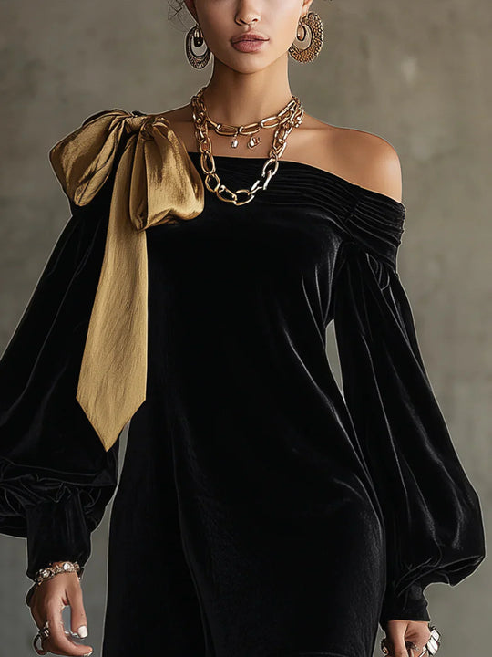 Nora – Minivestido de terciopelo negro y lazo satinado