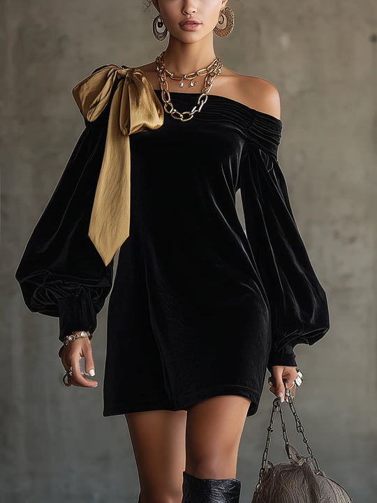 Nora – Minivestido de terciopelo negro y lazo satinado