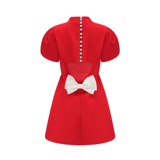 Ana – Vestido mini rojo con mangas pétalo y lazo