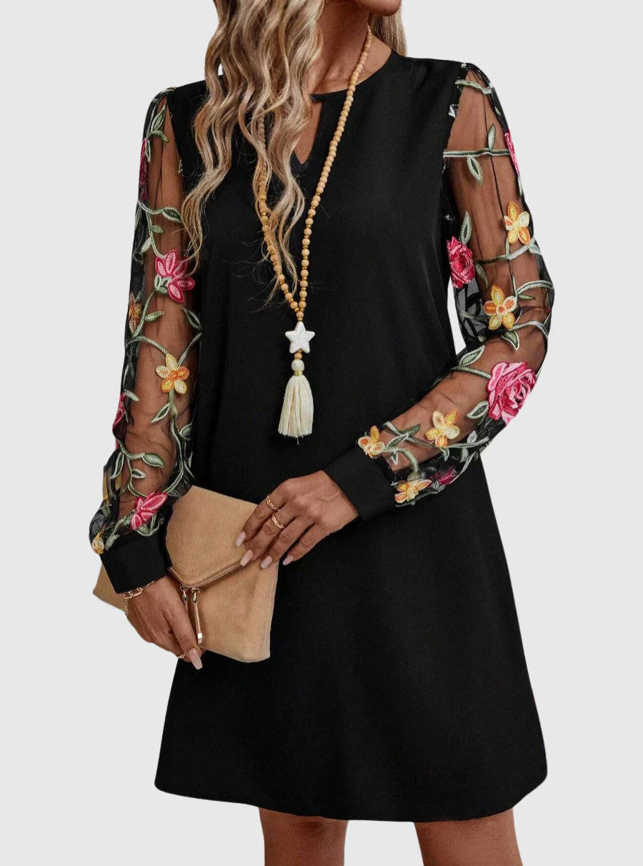 Martina - Elegante vestido con escote en V y mangas llamativas