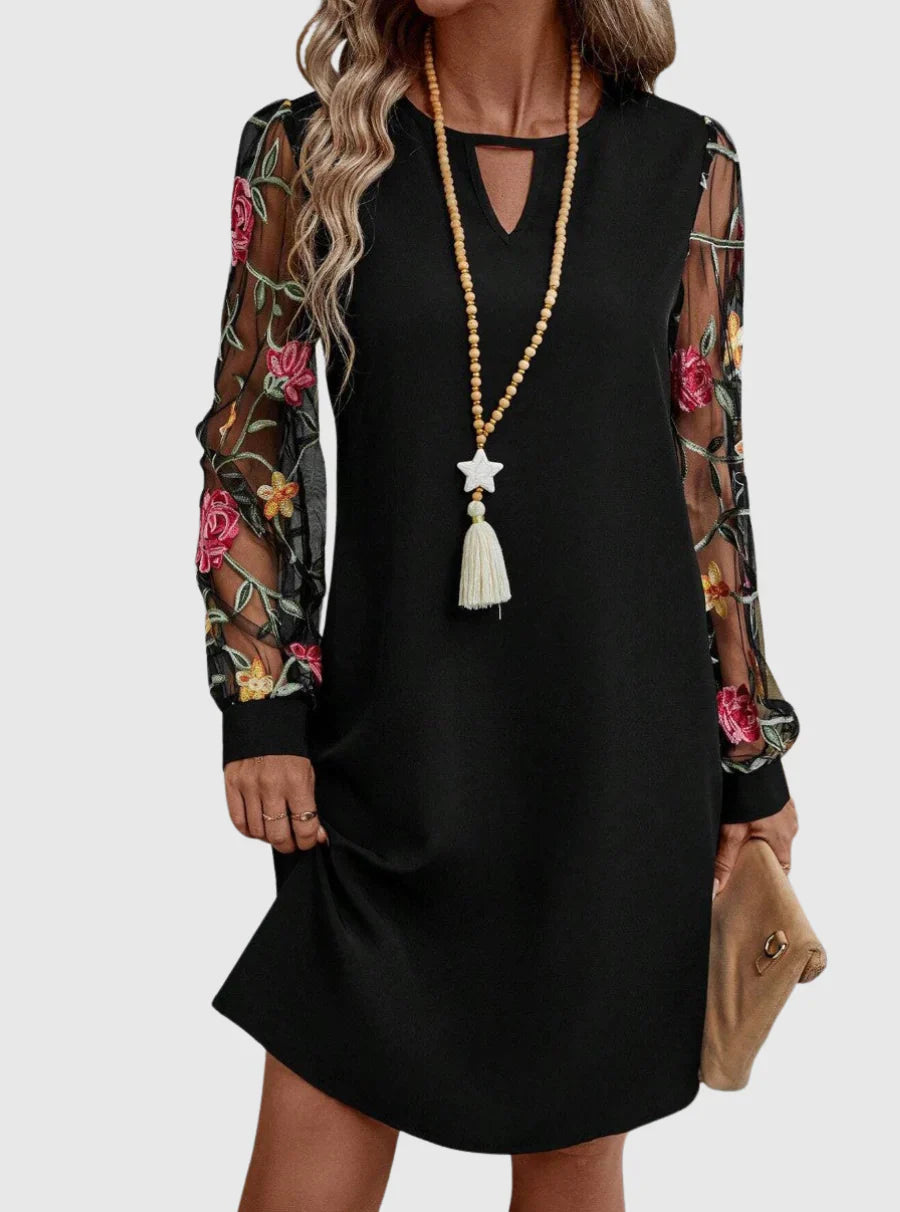 Martina - Elegante vestido con escote en V y mangas llamativas