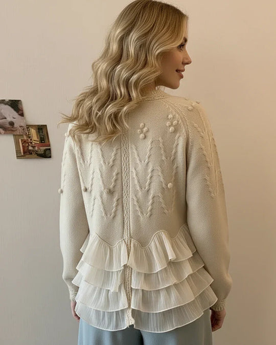 Nina – Cárdigan elegante con volantes