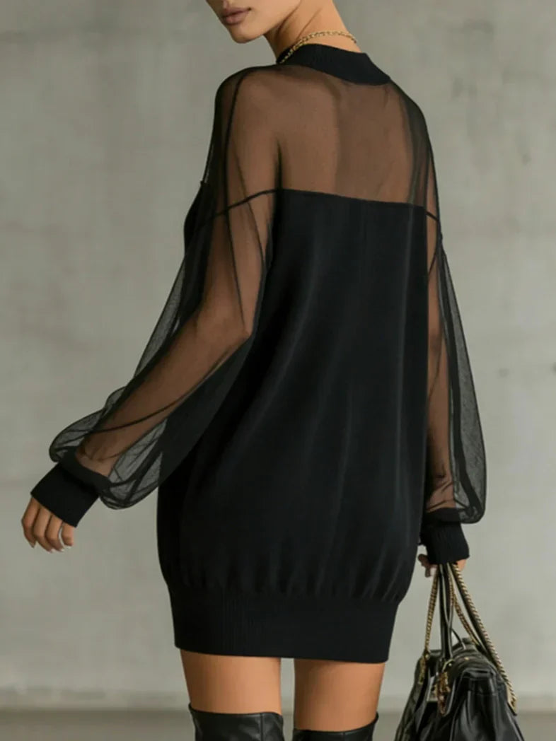 Susana – Minivestido negro con cuello alto y malla