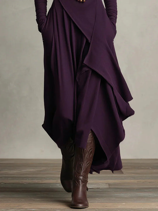 Nerea – Vestido maxi de cuello alto con diseño asimétrico