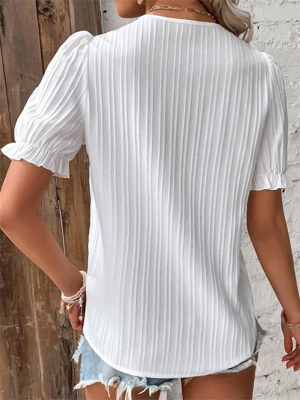 Pilar - Blusa plisada con encaje y manga abullonada