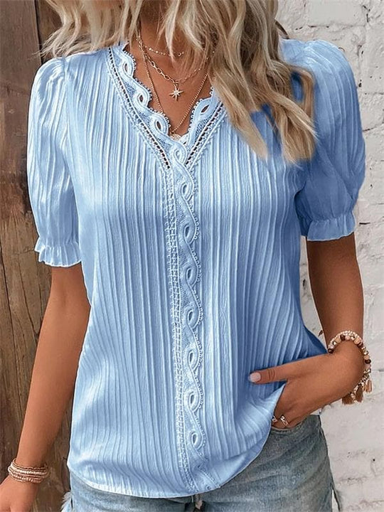 Pilar - Blusa plisada con encaje y manga abullonada