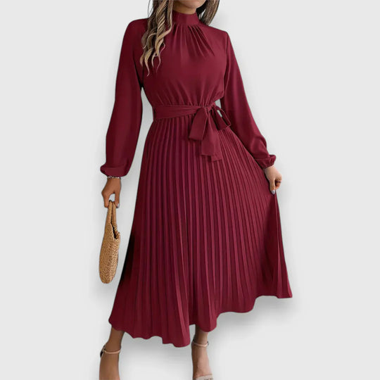 Valeria™ – Vestido midi plisado con lazo y cuello alto