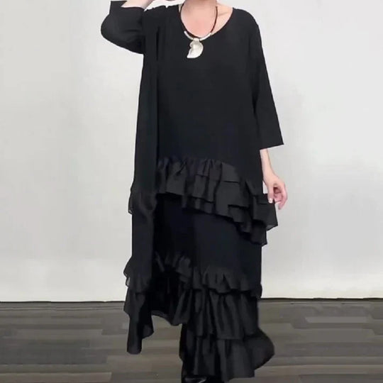 Eva – Vestido oversize fluido con volantes y capas